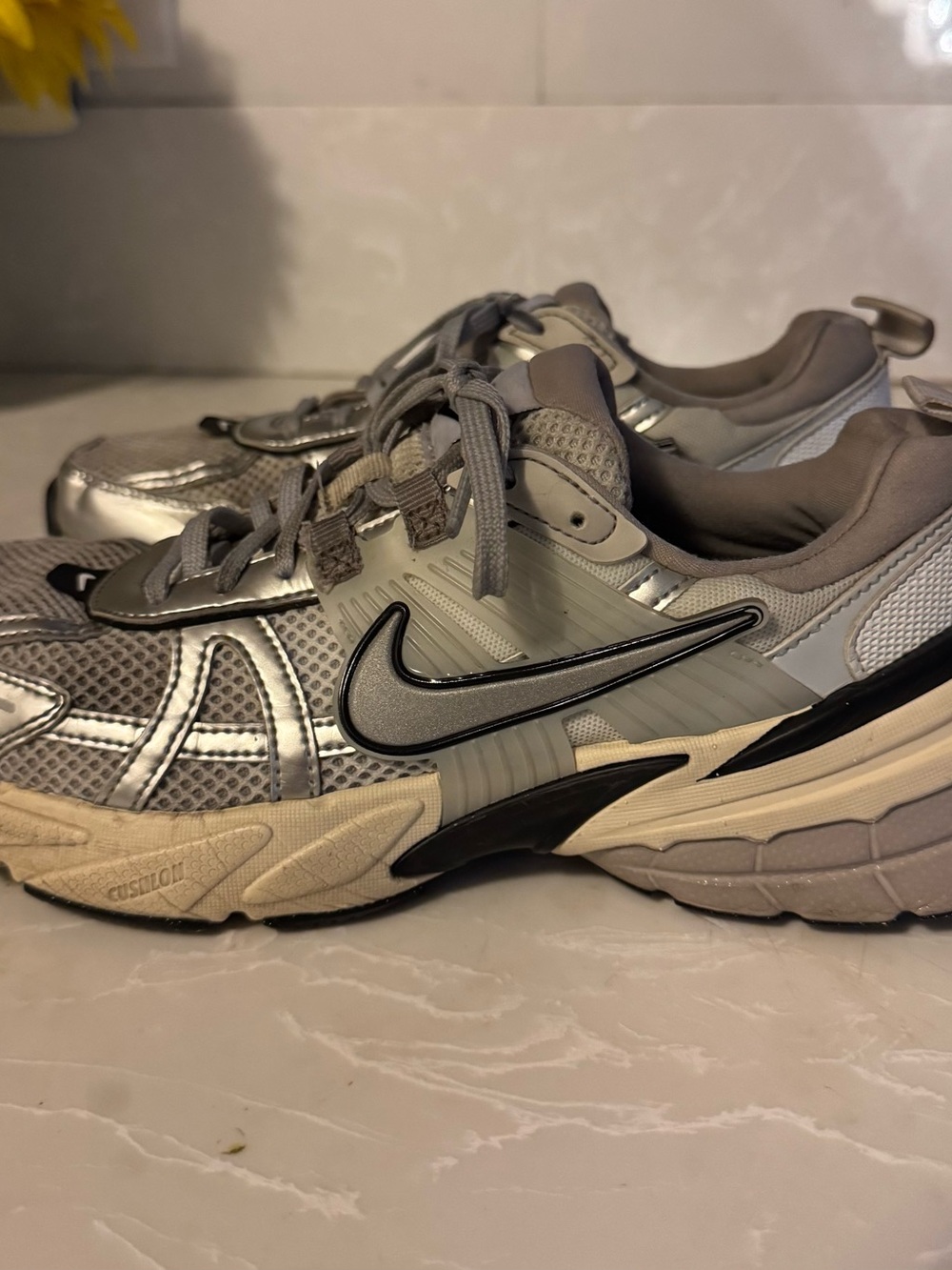 Nike Men’s Silver and Gray Running Sneakers with Black Swoosh